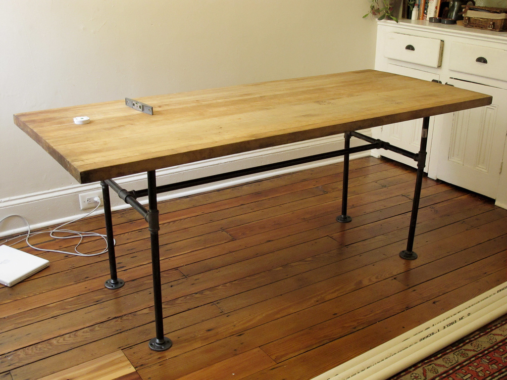 butcher block table with black legs